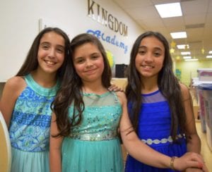 Celebrating the moment at Kingdom Academy as 2017 National Elementary Honor Society inductees are long-time classmates (l to r) Samantha Highes, Camila Diaz, and Georgina Paez, honored at their Hammocks/West Kendall campus.