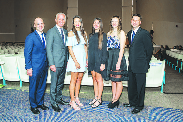 Richard Barbara, founding partner at Miami law firm Alvarez Barbara LLP, was a special guest speaker at Gulliver Preparatory School’s National Honor Society (NHS) induction ceremony on Wednesday, Apr. 5, at the school’s Miller Drive Campus. One hundred thirteen  Gulliver students were inducted at the event that was attended by 200 parents, friends and school faculty and staff.  Barbara spoke at the induction ceremony about the significance of public service. “Serving your community is founded on the belief that one individual can truly make a difference in the lives of many,” he said. “And what nobler example of teaching and enabling students in dedicating their time and resources to help the less fortunate than Gulliver.” NHS is the nation's premier organization established to recognize outstanding high school students who have demonstrated excellence in the areas of scholarship, service, leadership, and character. Founded in 1921, the organization at the school level elects officers who are supervised by a chapter adviser. “Students are inducted into NHS based on four criteria: scholarship, leadership, community service and character growth,” said Dr. Christopher Calvo, a Gulliver Prep social science faculty member who also serves as NHS faculty advisor. “It is such a pleasure to work with these bright and enthusiastic students who are fully committed to the highest standards of NHS.”