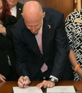 rick scott signing marijuana bill-min