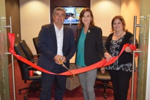 Co-Founder Bora Celenk at the grand opening of 4A Labs, joined by Greater Miami Chamber of Commerce COO Cornelia Pereira (center); and SVP Liane Ventura.