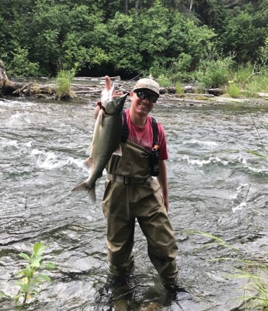 Airman 1st Class Josh Myers enjoying a day off from his work at JBER, Alaska. He caught this pink salmon at 'Resurrection Creek' near base. Thank you for your service Airman Myers.