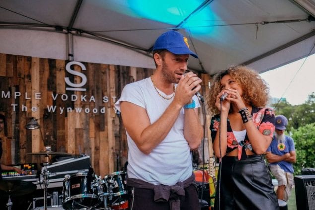 Chris Martin joins Izzy Bizu on stage at The Wynwood Yard