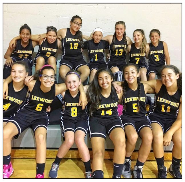 The 2016-2017 Leewood Girls Basketball Team. Top row (left to right): Samiya Merceron, Micaela Luis-Valdes, Isabelle Olmeda, Samantha Suarez, Leslie Rodriguez, Alyssa Dominguez, Brooke Rebhan. Bottom row (left to right): Emelie Perez, Dori Miller, Hailey Milgazo, Yesenia Pozo, Olivia Silva, Cassie Martinez.