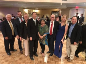 The 2017 Gala served as a formal welcome to incoming Chairman Ken Kistner. In photo (l to r): Attorney Dexter Lehtinen, outgoing Chair Joe Gallaher of NAI Miami, Palmetto Bay Councilwoman Karyn Cunningham, South Miami Mayor Philip Stoddard, Miami-Dade County Commissioner Daniella Levine Cava, ChamberSOUTH Chairman Kistner of CBT College, Cutler Bay Mayor Peggy Bell, and Palmetto Bay Vice Mayor John DuBois.