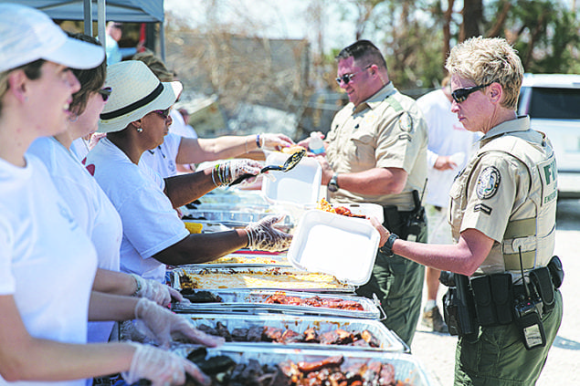 Employees from The Palace Gardens help with recovery in the Lower Keys