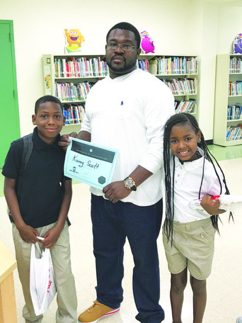 Whigham Elementary conducts reading event for dads