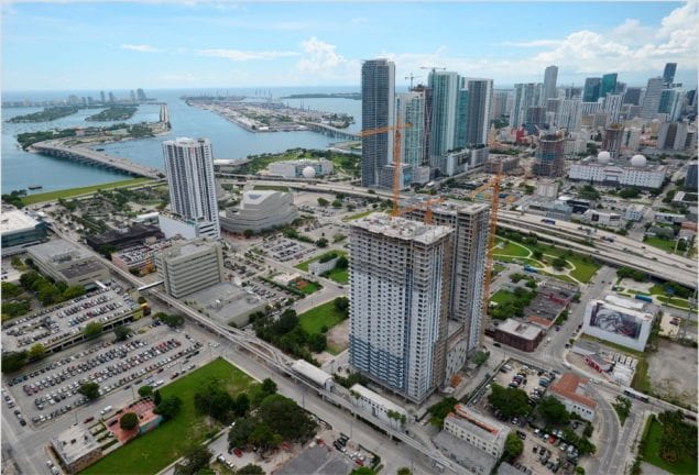 Square Station apartment towers top off construction at 34 stories