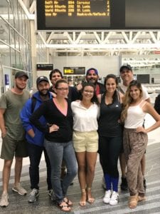 Ross University student evacuees back on terra firm, at MIA (Quevedo is second from right, front row).