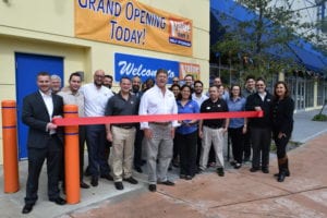 With a snip of the ribbon, Value Store It celebrates with neighbors, friends, employees, and members of the Greater Miami Chamber of Commerce.