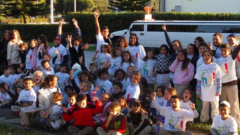 CHAP Kids bring joy of Chanukah to nursing home patients. Their transportation is a stretch hummer with a Menorah! More pictures at HebrewSchool.info