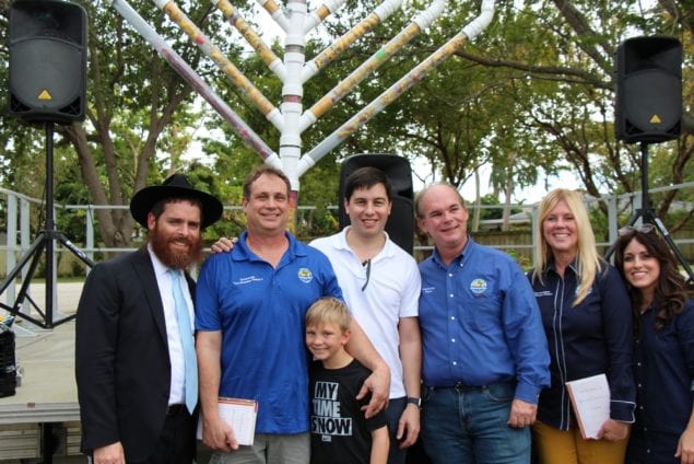 Village residents celebrate Hanukkah at Coral Reef Park