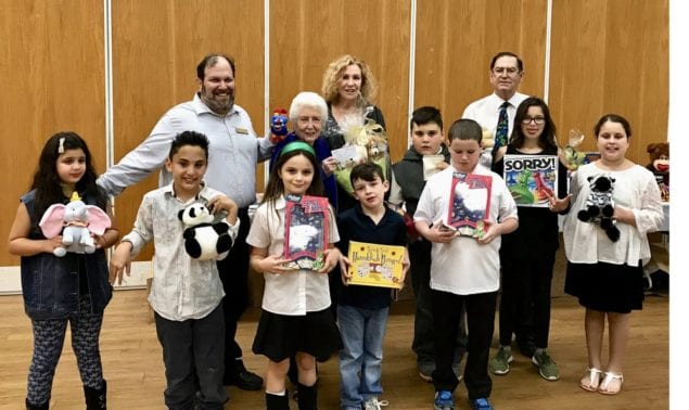 Congregation Dor Chadash donates funds and toys to JCS Shalom Bayit