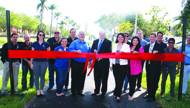 City makes big splash inaugurating canal stabilization and new bike path