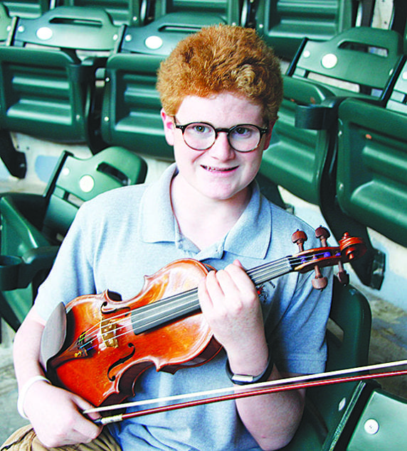 Student turns school’s struggles into success with concert