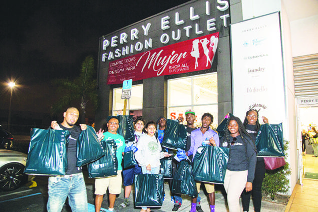 Perry Ellis partners to provide VIP shopping spree for families in need