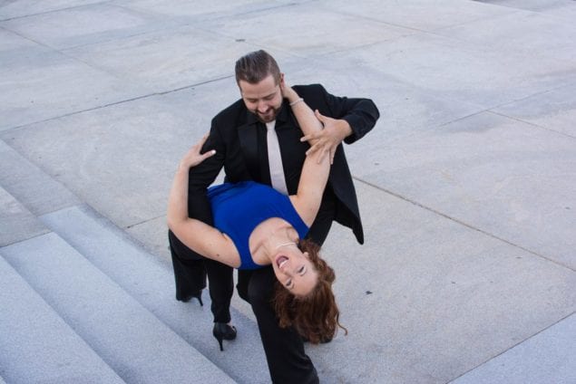 Dynamic couple shines on ballroom dance floor