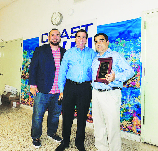 Pictured (l-r) are Chris Valdes, COAST lead educator; Councilmember Michael Callahan, and Javier Giraud.