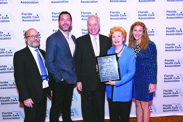 Elaine Bloom named Arthur H. Harris Government Services Award Recipient