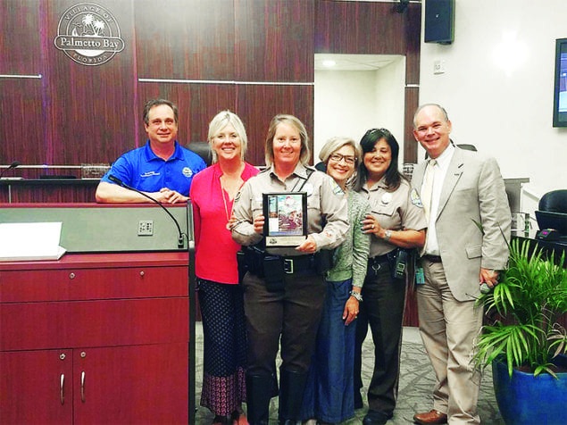 MDPD Motor Officer Lisa Ferro recognized at village ceremony