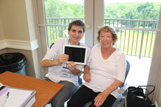 Teen Logan Spiegelman helps seniors with their tech devices