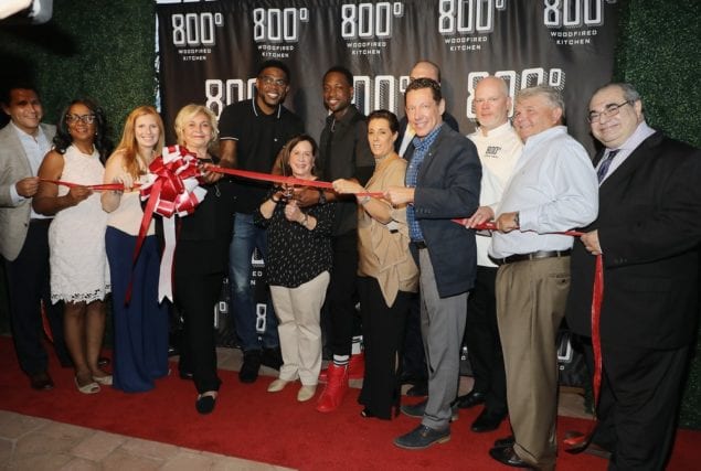 Aventura officials cut red ribbon for 800° Woodfired Kitchen