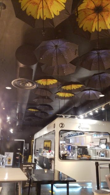 Umbrellas fill the 'sky' at Fixpresso in Coral Gables