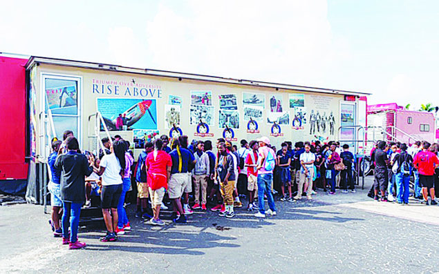 Students learn about the Tuskegee Airmen at ‘Rise Above’