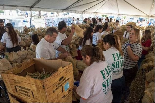 Commissioner, Farm Share distribute 50,000 pounds of food for holidays