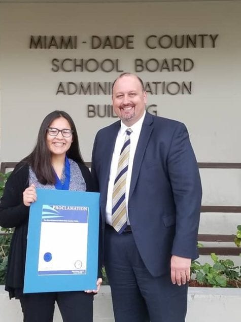 Pictured are student Kristina Alzugaray (left) and Lucas J. De La Torre, principal of Cutler Bay Senior High School.