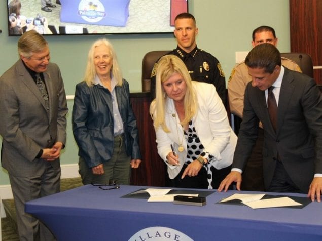 Officials from Miami-Dade Schools, Police and Village of Palmetto Bay sign Memorandum of Understanding regarding School Resource Officers.