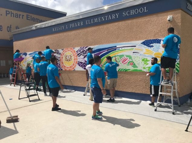 As part of National Volunteer Month celebrations, about 100 AT&T employees completed a beautification project at Kelsey L. Pharr Elementary School in Miami. City Year, an education organization that helps students and schools succeed, coordinated the project for AT&T. The AT&T volunteers spent their day at the NW 46th Street school: • Painting more than 20 murals themed around inspirational quotes, school pride/school logos and school pillars for success; the murals — ranging in size from 2-by-3 feet to 80-by-8 feet — span the entire school campus; • Painting the teacher’s lounge; • Building benches, and • Creating banners with motivational messaging for the cafeteria and teacher’s lounge “AT&T employees are committed to serving their communities across the country,” said Joe York, president of AT&T Florida. “We are thrilled to partner with City Year’s Care Force team to help transform schools and neighborhoods into brighter, more vibrant spaces for all.” The Miami AT&T Day of Service is just one of many marquee volunteer events with City Year’s Care Force team happening nationwide and engaging hundreds of AT&T employees. “We are excited to partner with AT&T to engage employees in high-impact service days to create more welcoming environments for students in communities across the country," said Michael Brown, City Year co-founder and CEO.