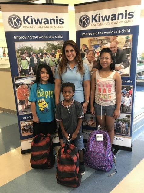 Biscayne Bay Kiwanis Distributes 100 backpacks, school uniforms, supplies