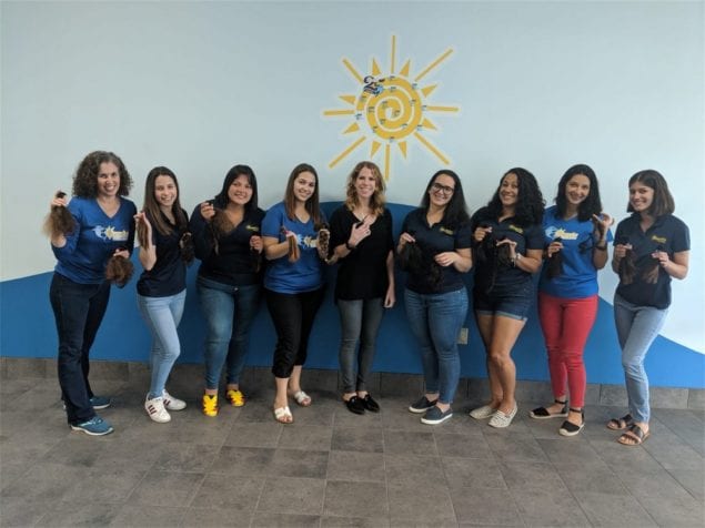 Ocaquatics team members donate their locks to kids with hair loss