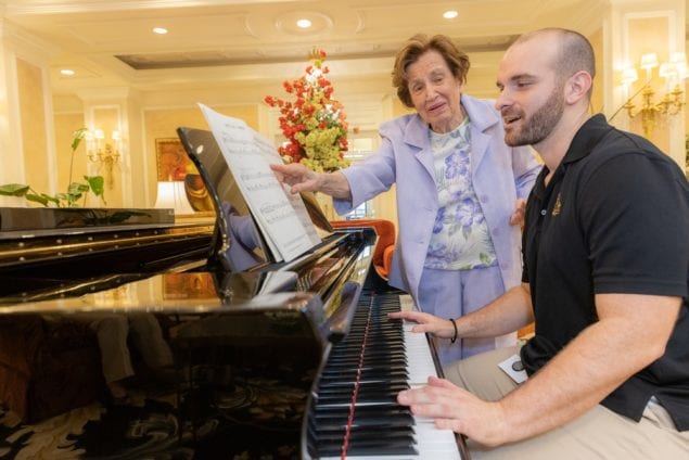 Palace Coral Gables resident shares her love of music with staff member