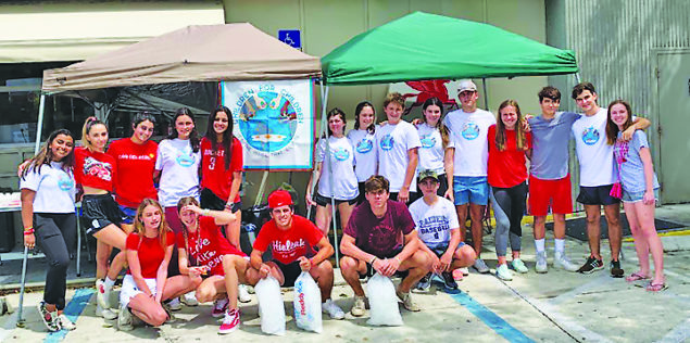 Children for Children has car wash for charity