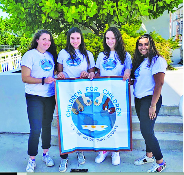 Local students form club to help children in need