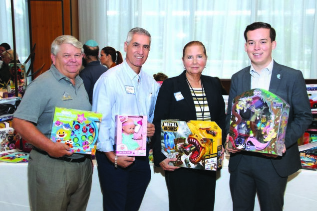 AC Hotel and FPL host holiday Breakfast Meeting with a cause