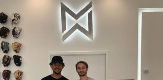 Midway Sports reopens its doors on S. Dixie Hwy. In South Miami Midway Sports owner Mike Tosar (right) is pictured with Jon Jay, Miami native and Major League Baseball player.