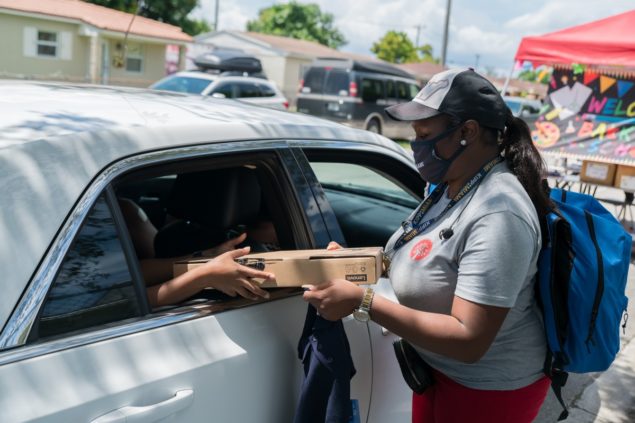 KIPP Miami charter school conducts school materials drive-through event