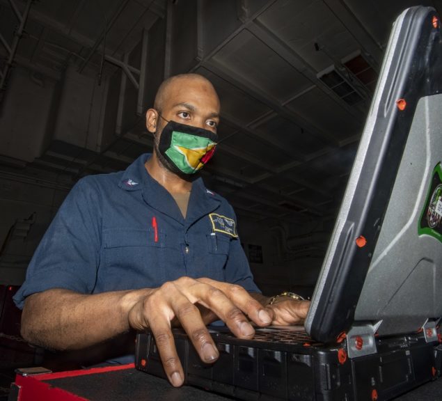 Miami Sailor serving aboard U.S. Navy aircraft carrier