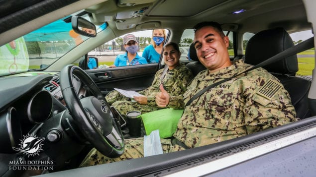 Mission United and Miami Dolphins host 'drive-thru' baby shower for vet moms