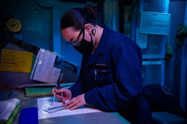 Miami Sailor stands watch aboard Navy aircaft carrier