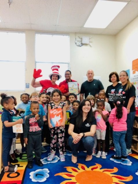 Members of the Kiwanis Club of Homestead-South Dade interact with kids during their weekly reading sessions at Chapman Partnership, including participating in arts and crafts and theme weeks, such as Dr. Seuss week. Pictured (l-r) are Head Start administrator Amy O. Christopoulos; Dr. Mario Alvarez, curriculum support specialist; Kiwanians Stephen Booker and Brandis Perez, VPK teacher Gladys Acosta, and VPK assistant teacher Marjorie Perez.