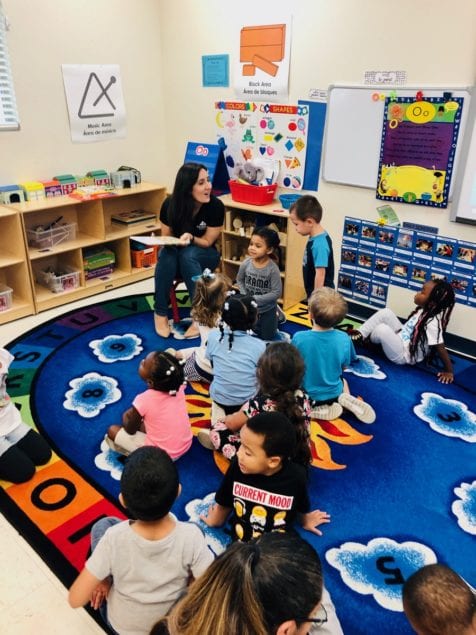 Brandis Perez reads — pre-COVID — to a class at the Chapman Partnership. The Kiwanis Club of Homestead-South Dade has continued its 15-year weekly reading tradition online.