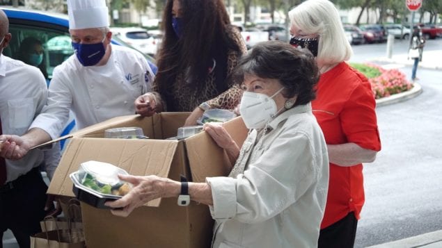 Aventura seniors deliver hot meals to first responders