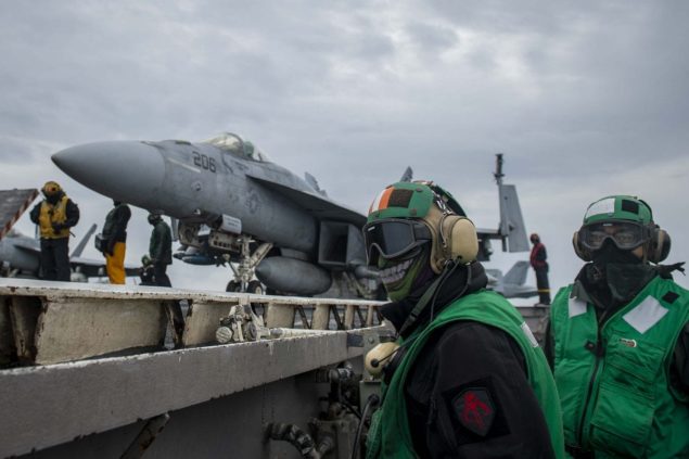 Miami Sailor prepares to launch aircraft aboard U.S. Navy carrier