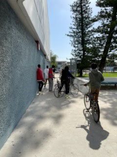 ORNA Security and Biscayne Cove ‘rain sunshine’ over North Miami Beach Sr. High with bike donation