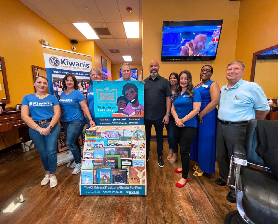 Homestead Kiwanis help place books Into two Miami Clippers barbershops