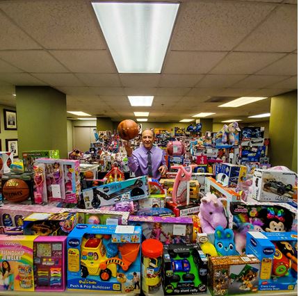 Clerk of Courts Harvey Ruvin and team donate hundreds of gifts for Salvation Army