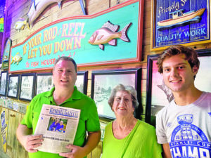 Kanzer Family reads favorite newspaper at the Fish House